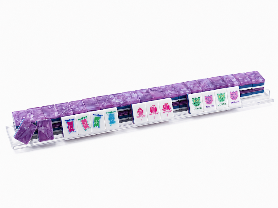 Mahjong tile row with purple marble-style backs and white face cards