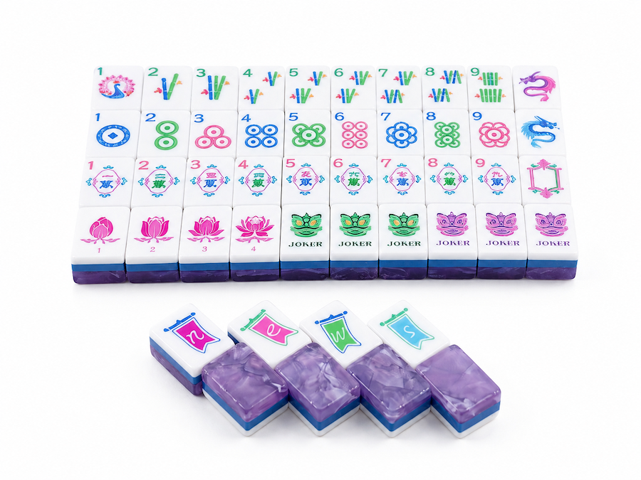 Mahjong tiles with suits and Joker faces, with several loose purple-backed tiles