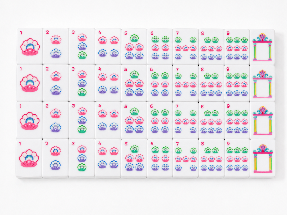 Mahjong tile set rows of numbered illustrated tiles with a few bright accessory tiles