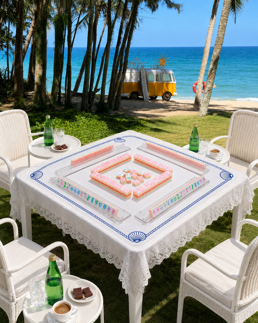Outdoor peach pearl mahjong tile table set on white lace tablecloth