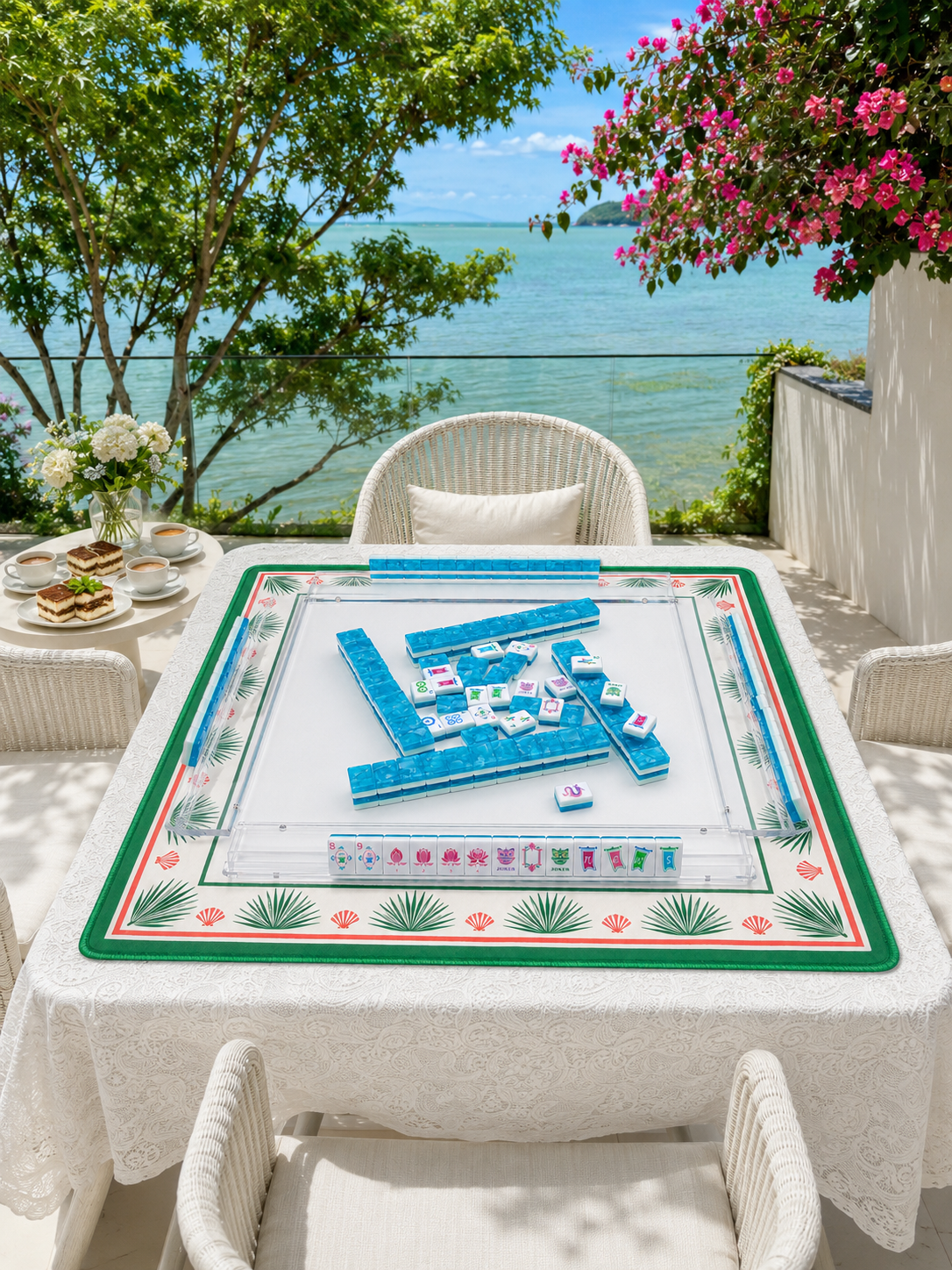 Outdoor mahjong table with blue-trimmed border and a stacked tile layout on top