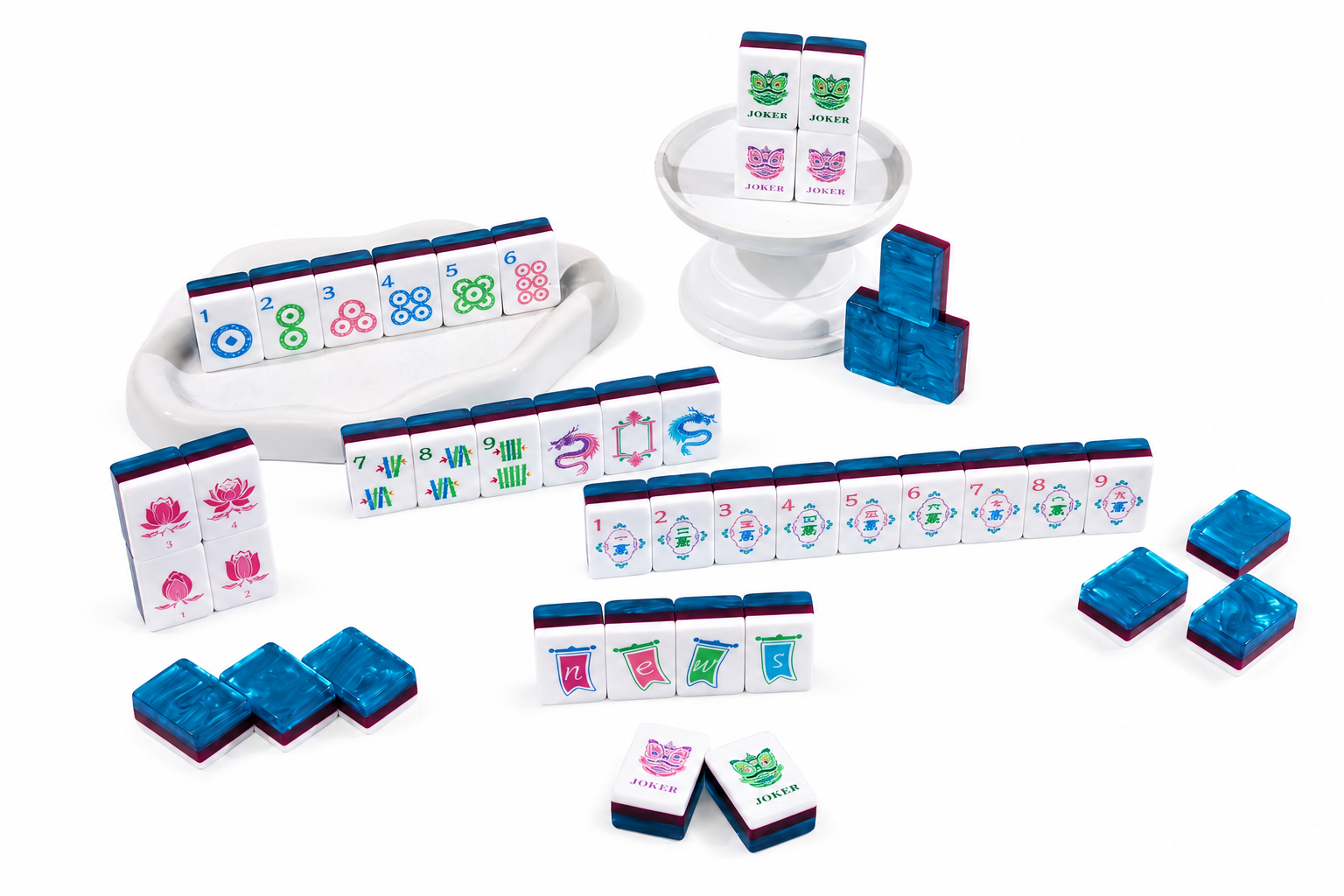 Blue and white mahjong tile set with racks, score tray, and tile backs
