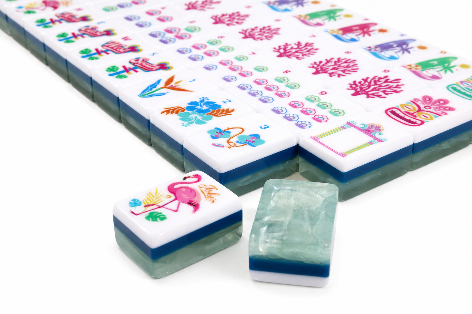 Colorful mahjong tiles on blue-green backs with a few spare tile blocks