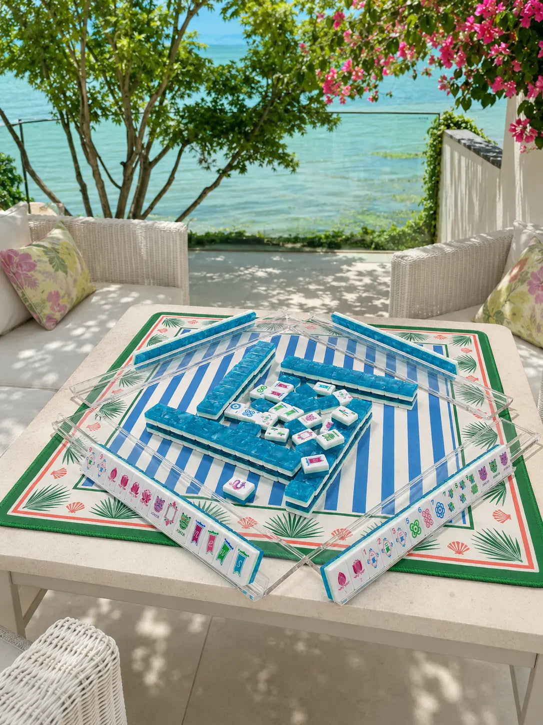 A blue Mahjong table overlooking the coast