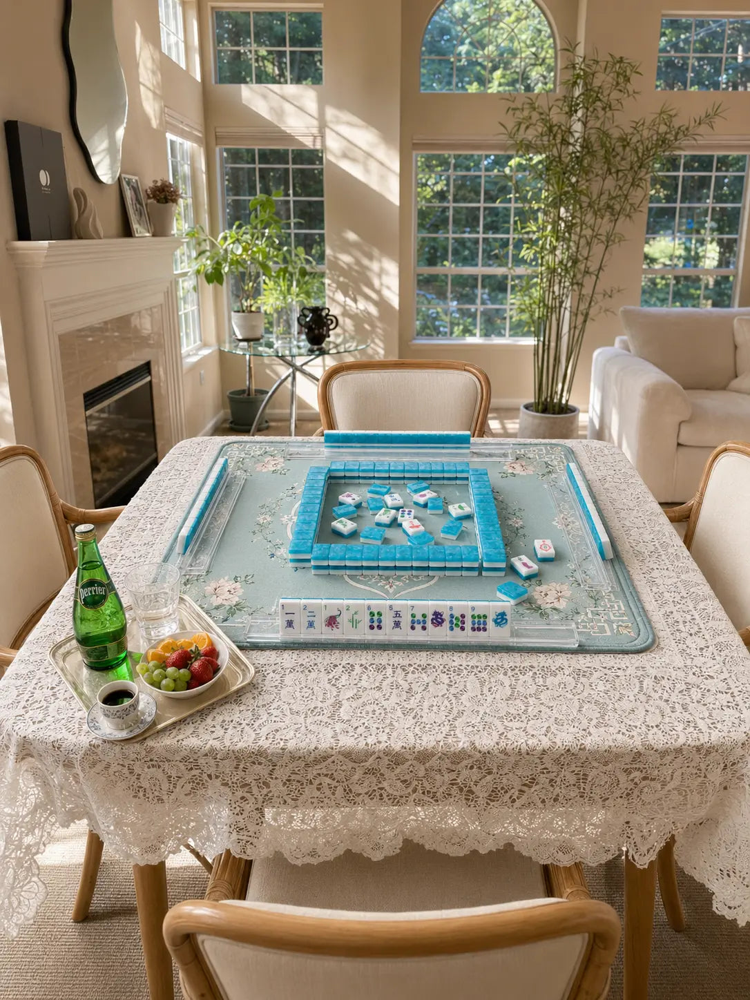 Four American Mahjong racks surrounding walls of tiles on a quiet beginner game table