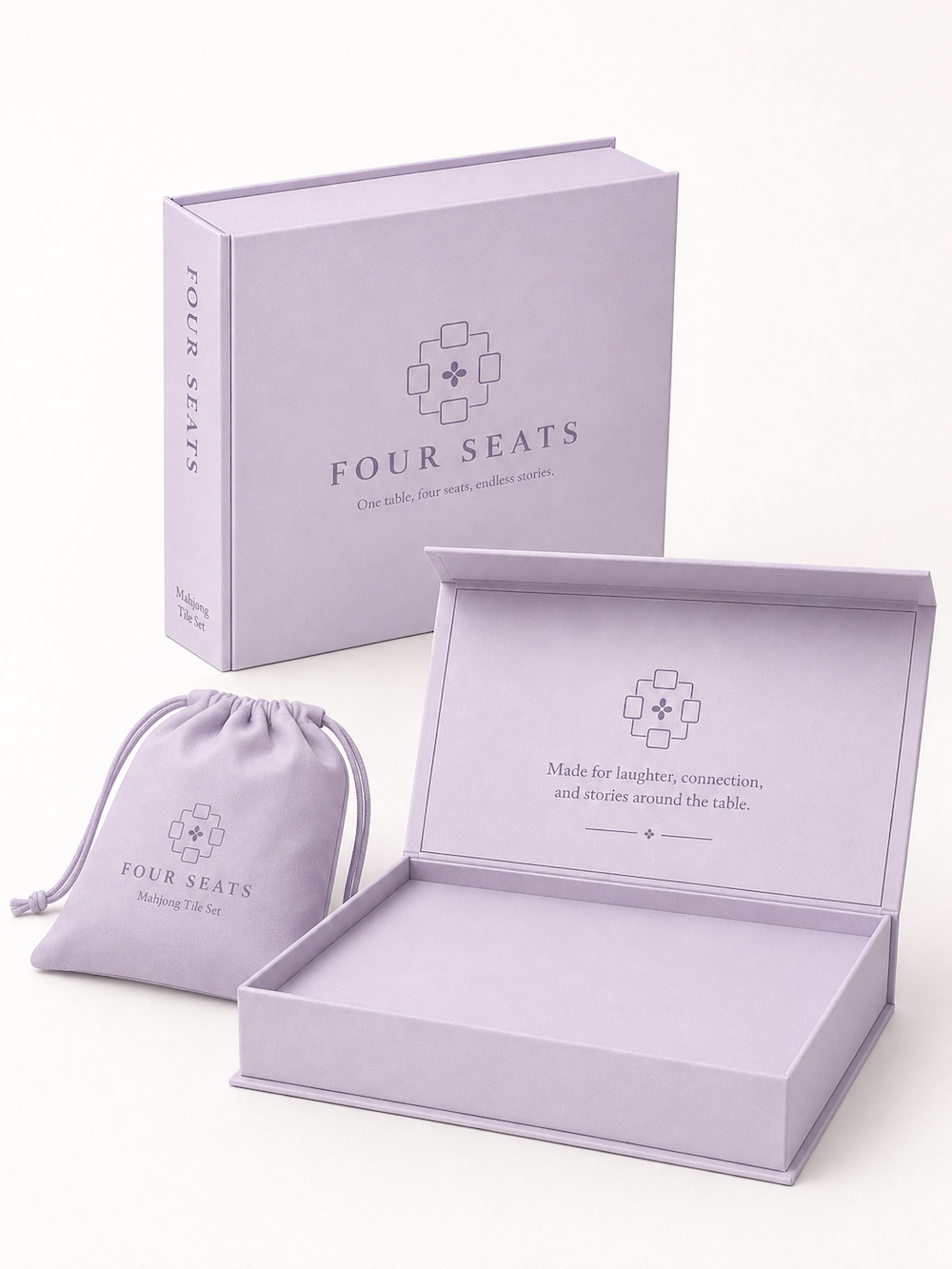 Four Seats branded gift box set with inner tray and drawstring pouch
