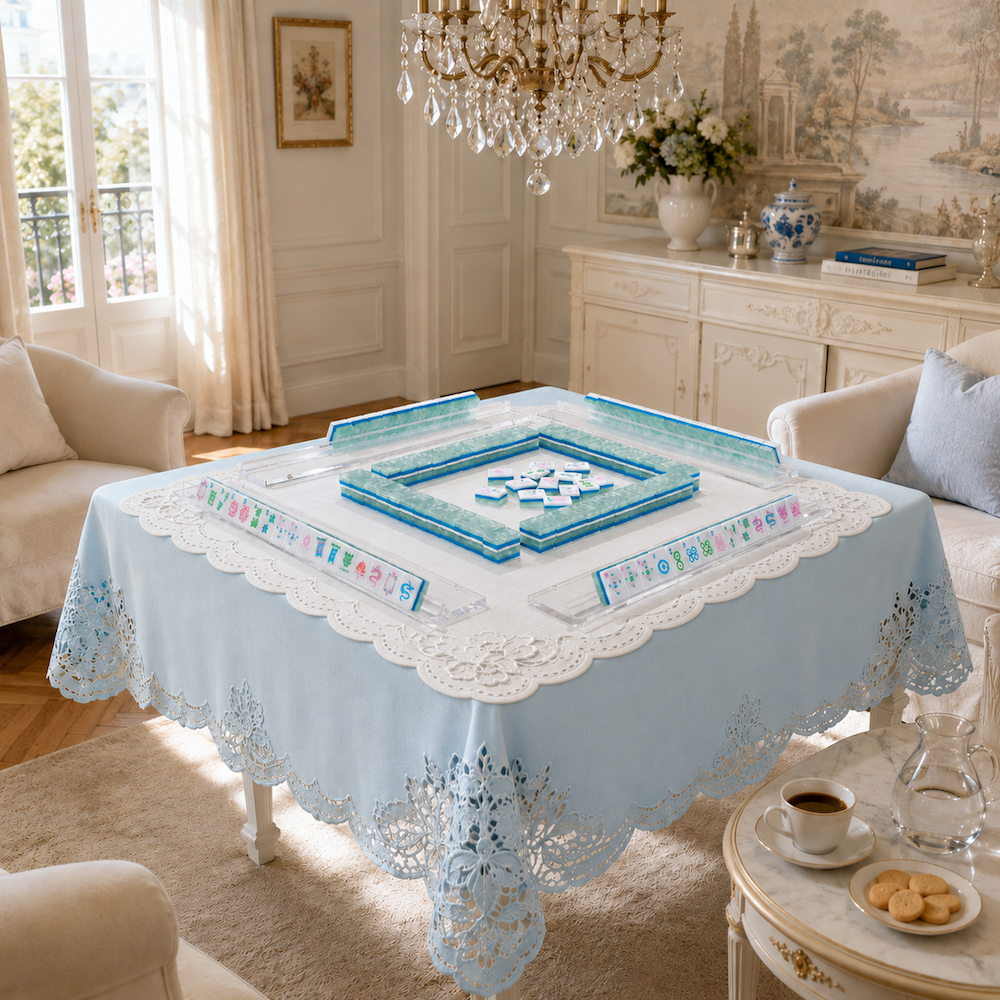 Mahjong table centerpiece with arranged jade-toned tiles on blue tray