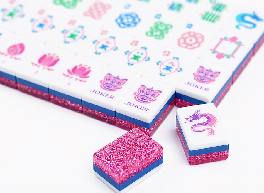 Club Pink Stardust American Mahjong tiles with sparkling pink backs and colorful tile faces
