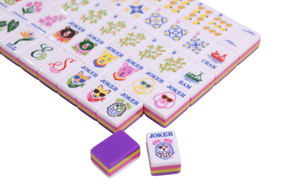 Orchard kids play mat with colorful cartoon print and folded corner