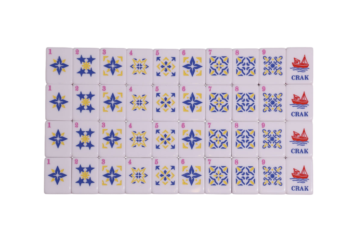 Star-patterned box set with blue and yellow motifs and red “CRACK” text