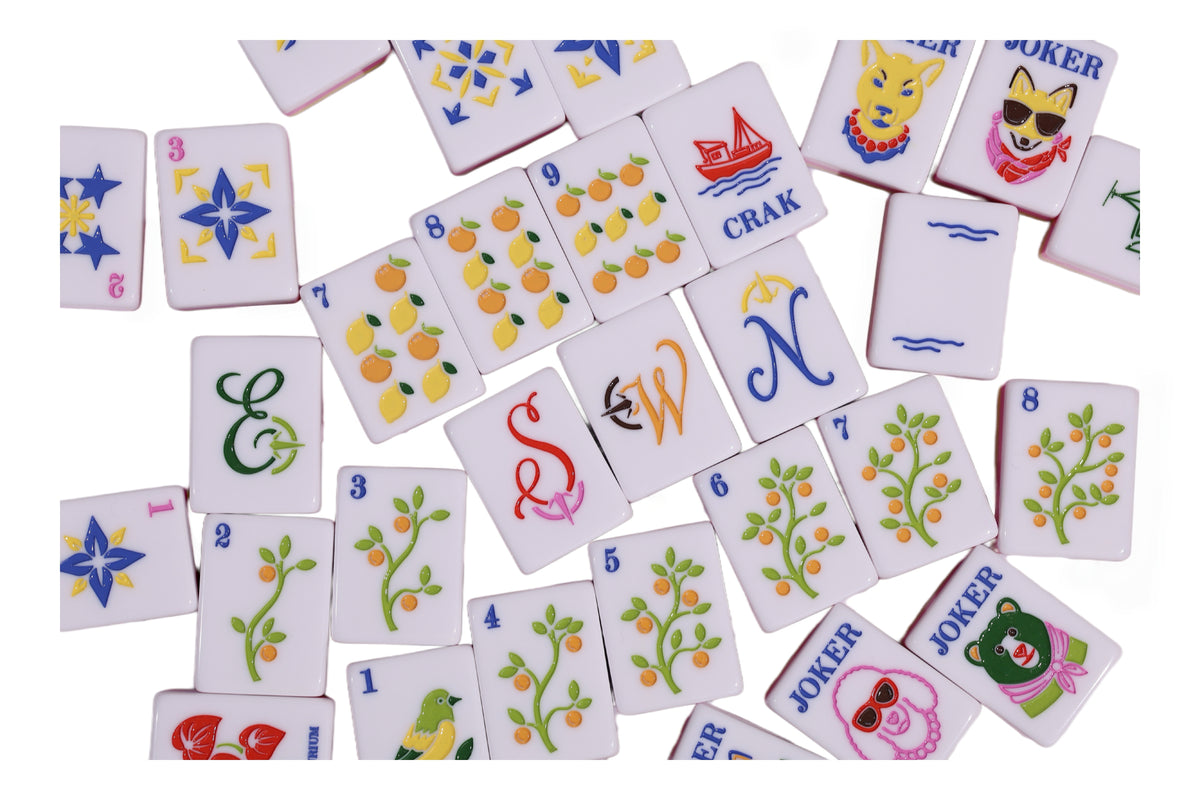 Orchard-themed playing cards with fruit and leaf illustrations, assorted suits