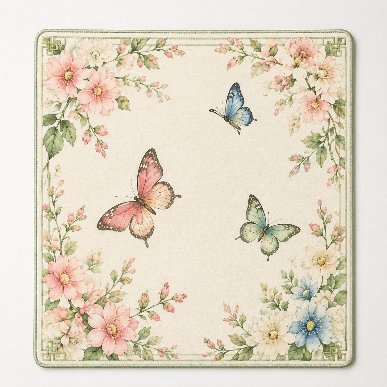 Floral butterfly mahjong mat with beige background, pink blossoms, and green edging