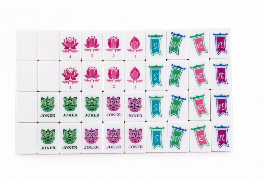 Mahjong tile set laid out, featuring flower tiles, suit tiles, and Joker tiles