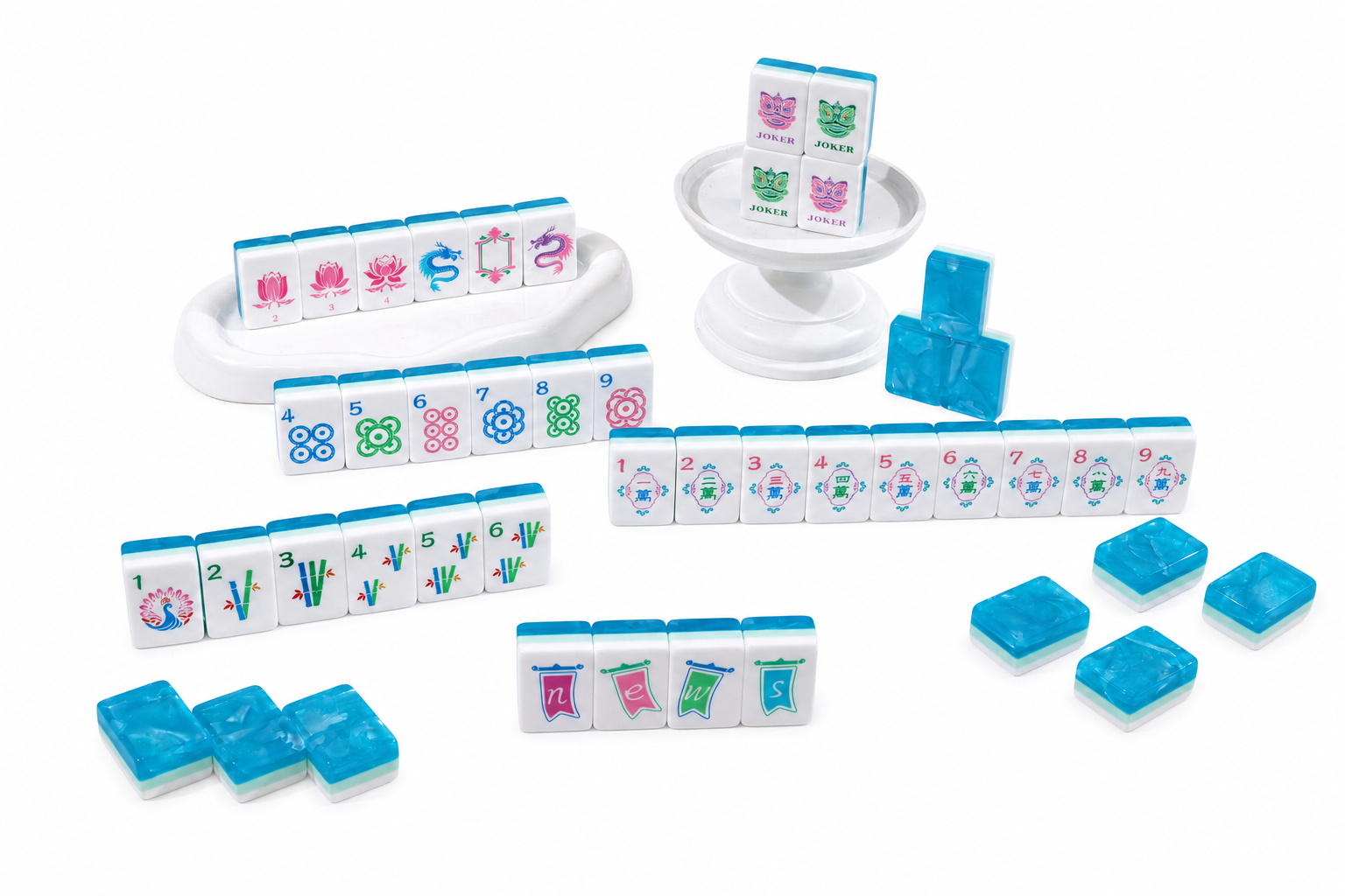Mahjong tile set components with blue tiles, tile racks, and a small dice-cup piece