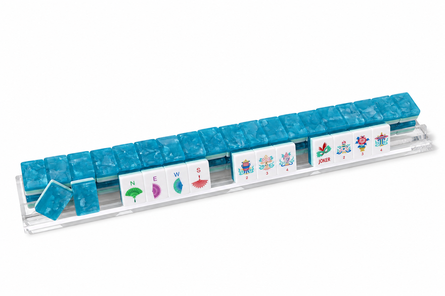 Mahjong tiles lined in a long rack with clear sides and lagoon-blue border